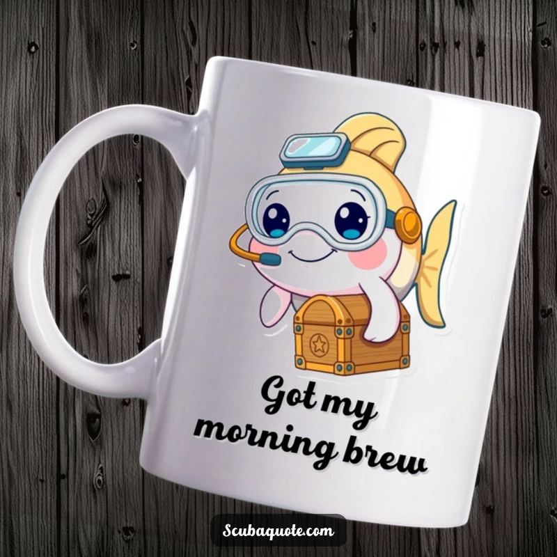 Funny mug with a cute, smiling fish in a diving mask holding a treasure chest, ready for underwater exploration.