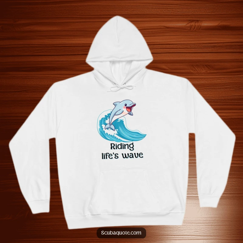 Funny happy dolphin leaping from a blue wave on a soft hoodie, perfect for ocean enthusiasts.
