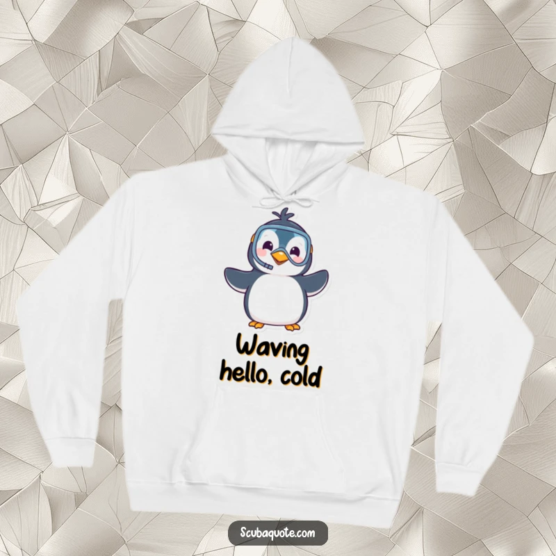 Funny hoodie depicting a cheerful penguin wearing a snorkel and mask, waving merrily, perfect for cozying up with a sense of adventure.