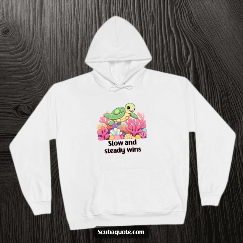 Funny hoodie featuring a content sea turtle navigating a lively coral reef, offering warmth and humor.
