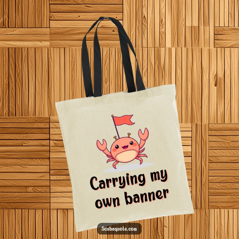 Funny tote bag with a happy crab scuttling forward with a tiny flag, great for carrying essentials with beachy, determined humor.
