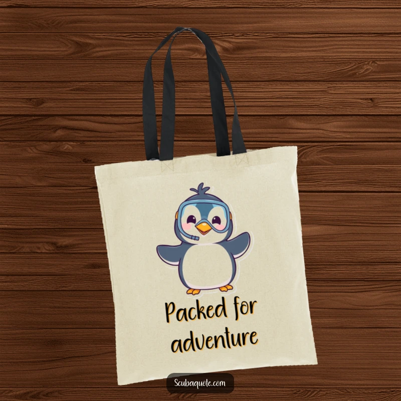 Funny tote bag featuring a playful penguin in snorkel gear, waving hello, perfect for carrying groceries or beach essentials with a smile.